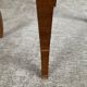 Small marquetry pedestal table with key storage