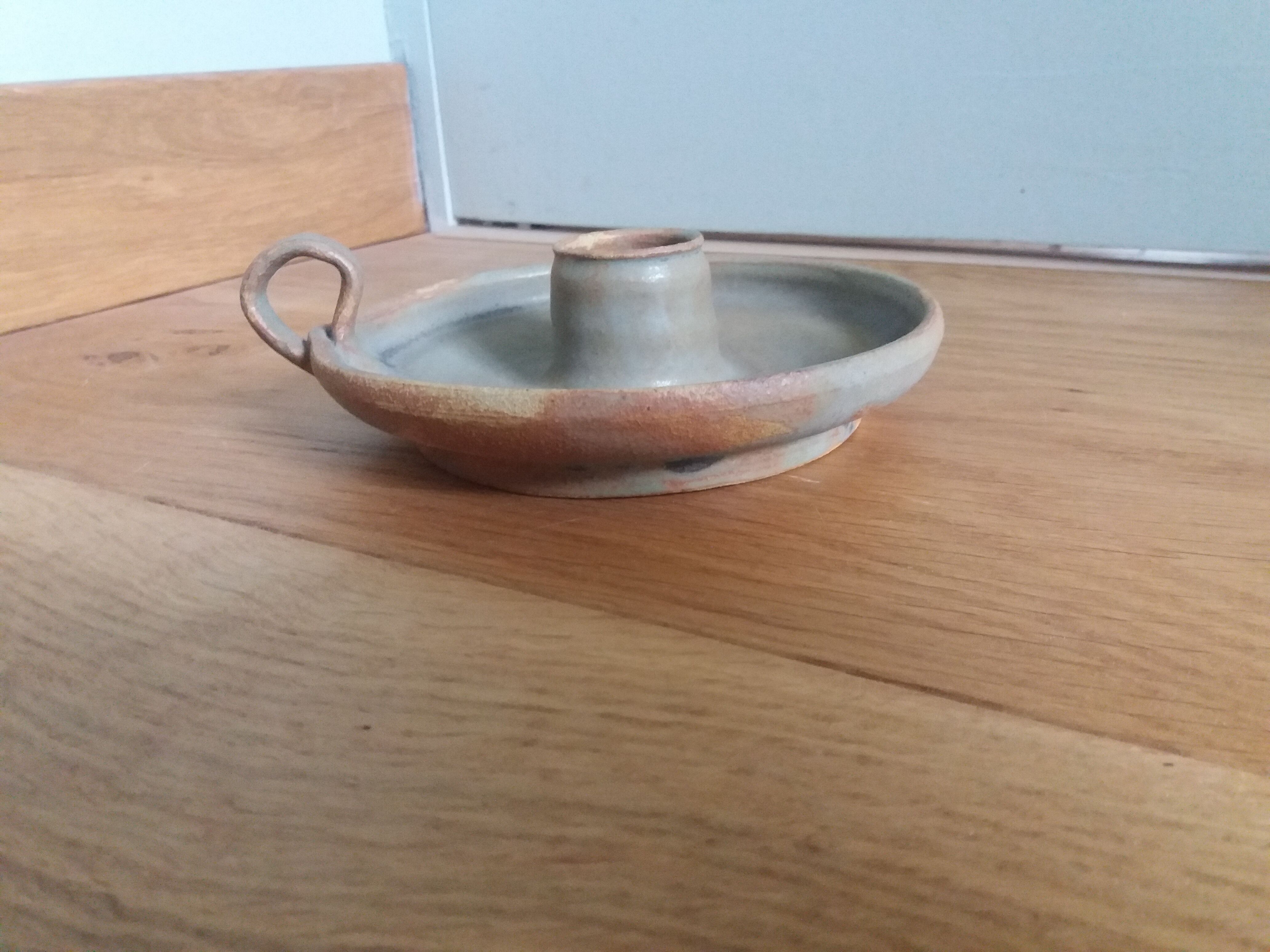Ceramic cellar rat candle holder signed