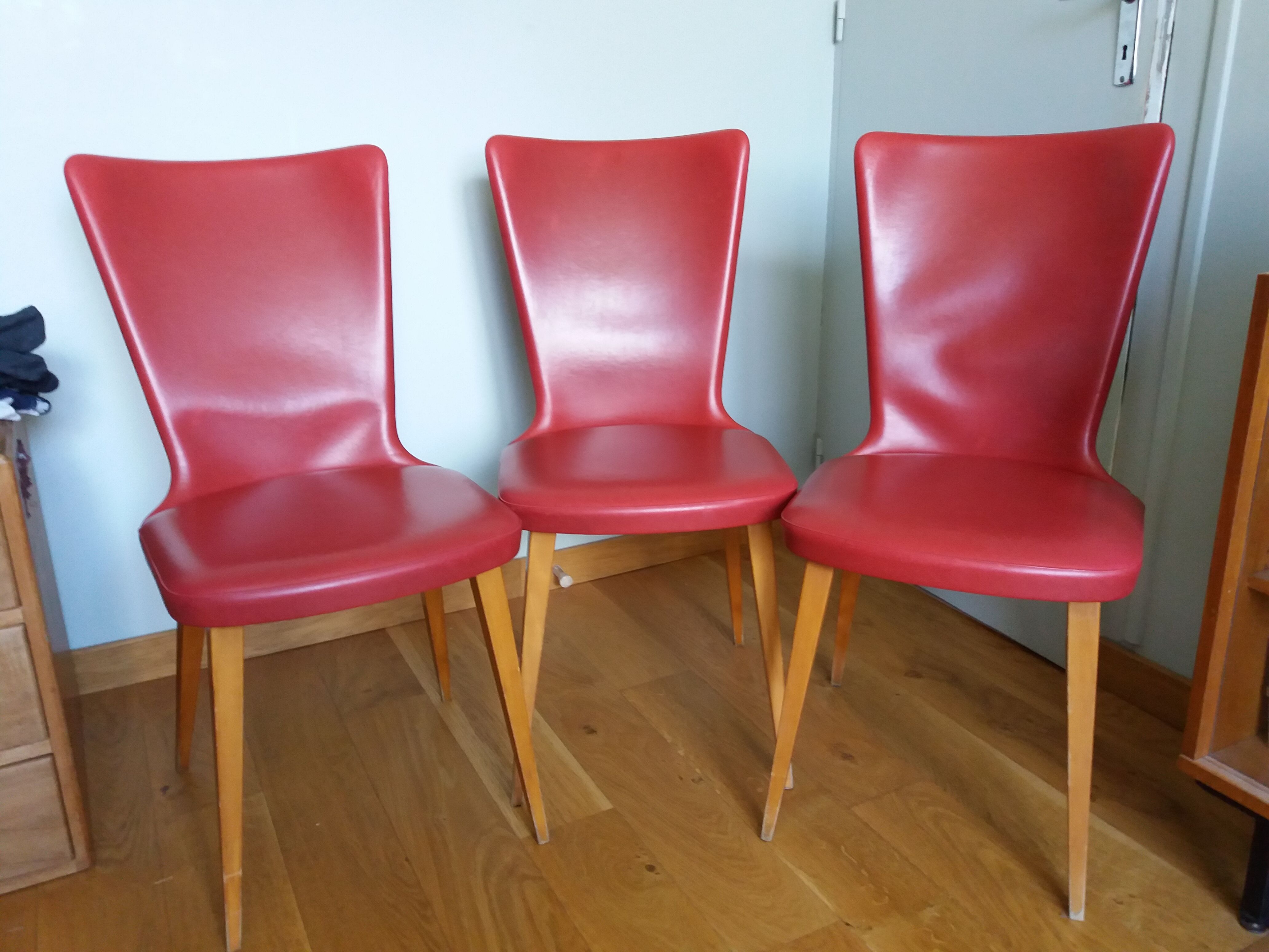 Baumann skai red imitation leather chairs from the 1950s