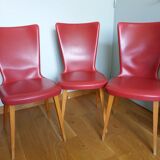 Baumann skai red imitation leather chairs from the 1950s