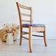 Antique upholstered wooden chair