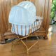 Bamboo, rattan, wicker cradle bassinet from the 1960s with a foldable support.