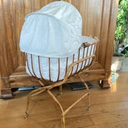 Bamboo, rattan, wicker cradle bassinet from the 1960s with a foldable support.