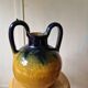 Pottery, jar, old jug in yellow and green glazed terracotta