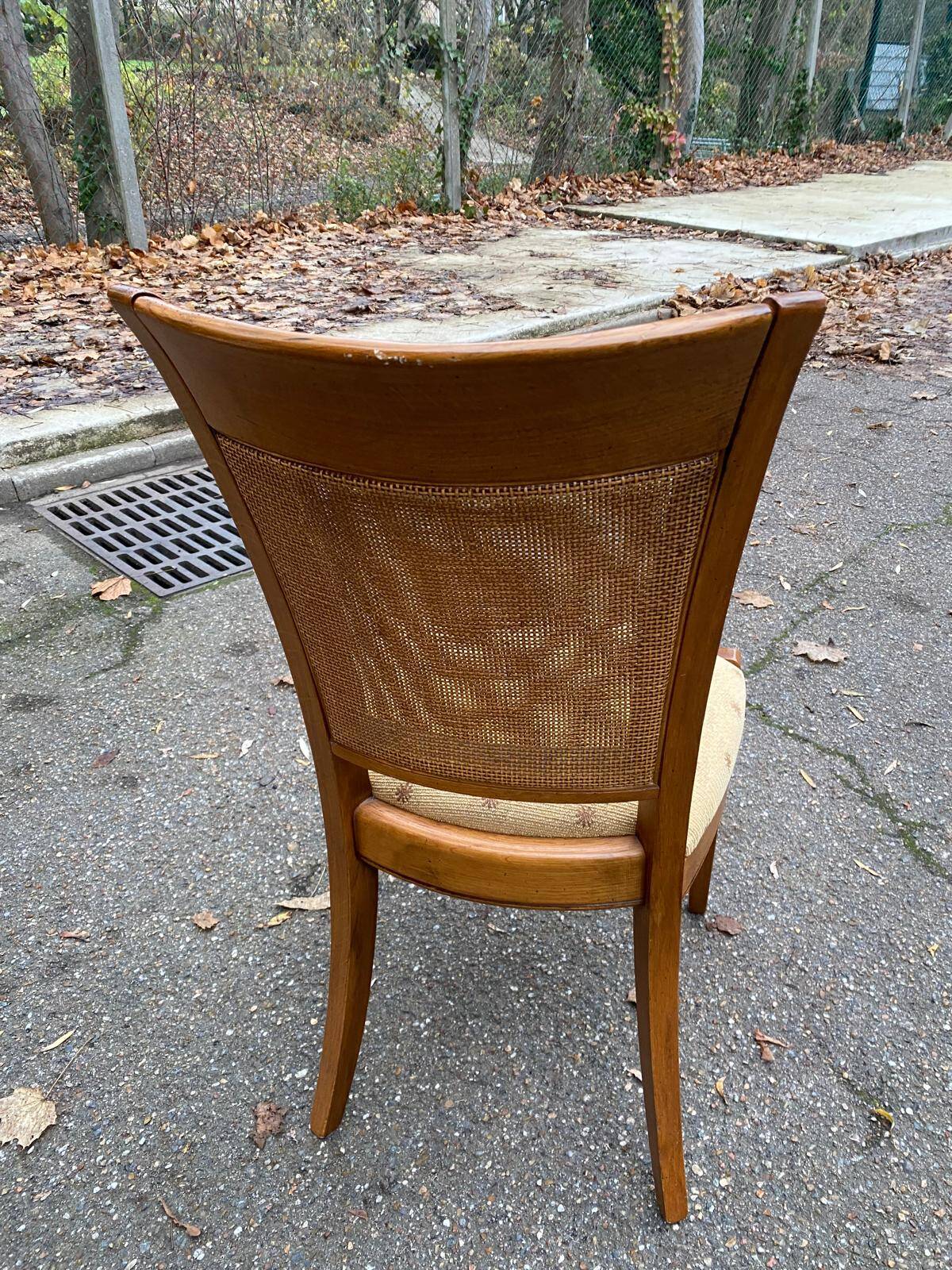 Four 20th-century Directoire-style chairs in solid wood with cane seats and beige fabric