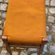 Louis XV piano stool in solid oak wood and orange fabric