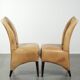 Set of six cowhide dining chairs with a comfortable seat and high back