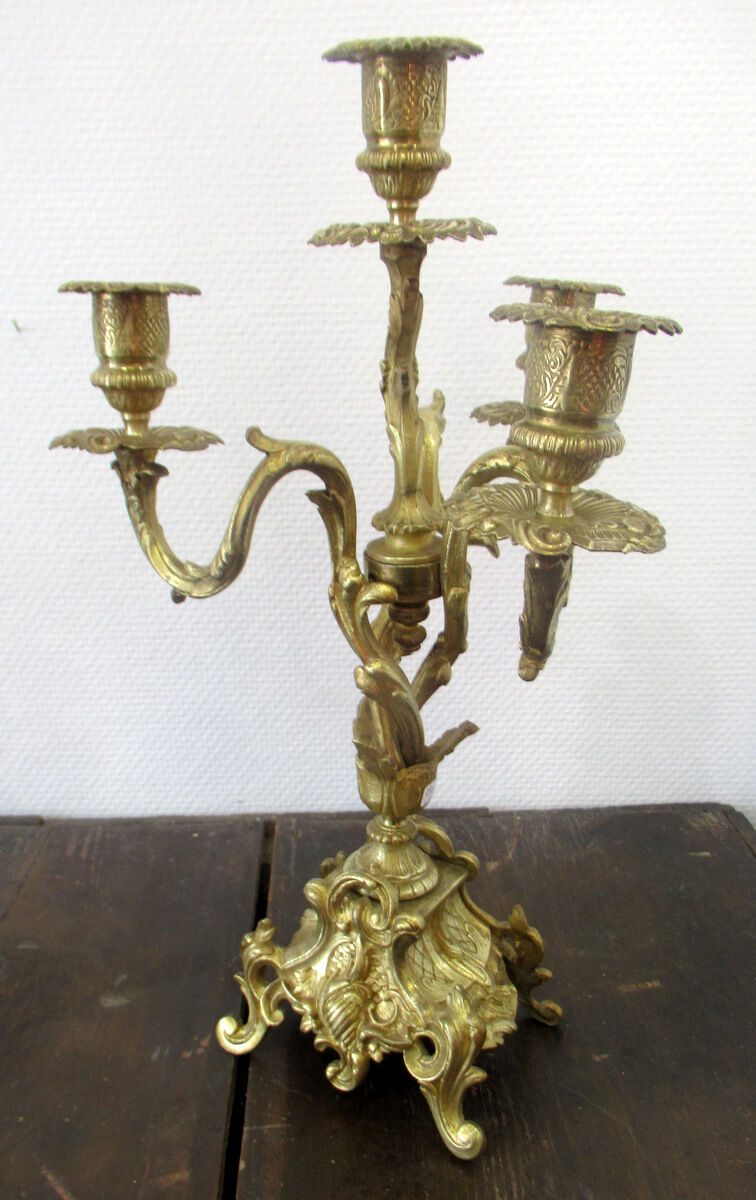 Pair of bronze candelabras and brass bobèches
