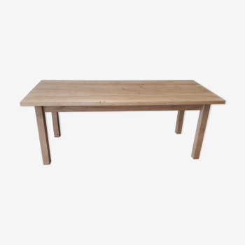 Solid table in raw wood