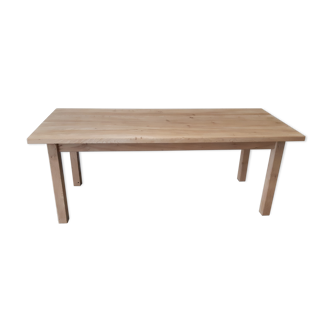 Solid table in raw wood
