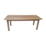 Solid table in raw wood