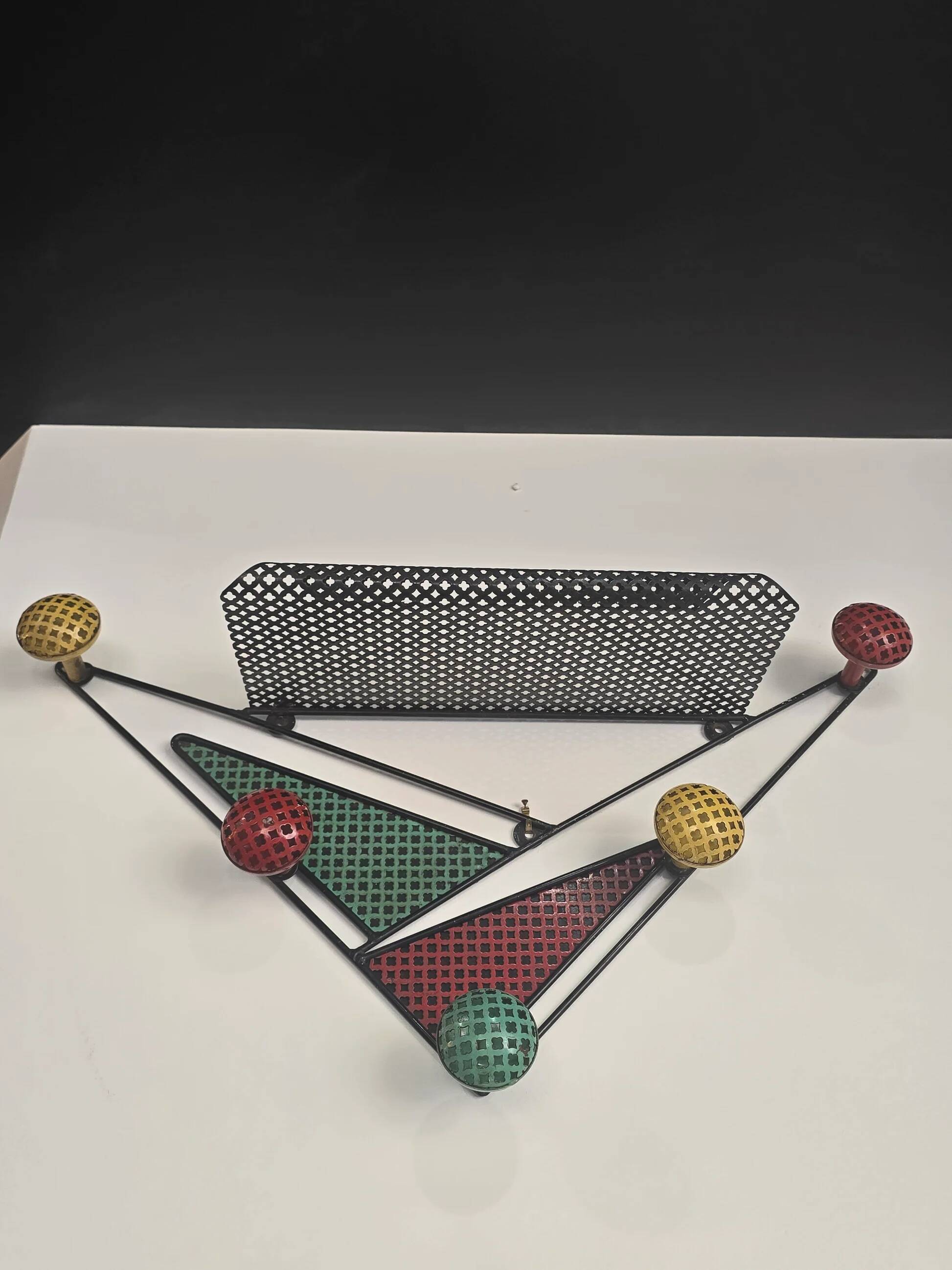Wall-mounted coat rack attributed to Mathieu Matégot – France, 1950s