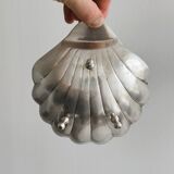 Silver metal shell emptier