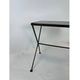 Modernist nesting tables in metal and black glass, 1950s.