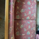 Art Deco style sofa, covered in Indian fabric with a pink background