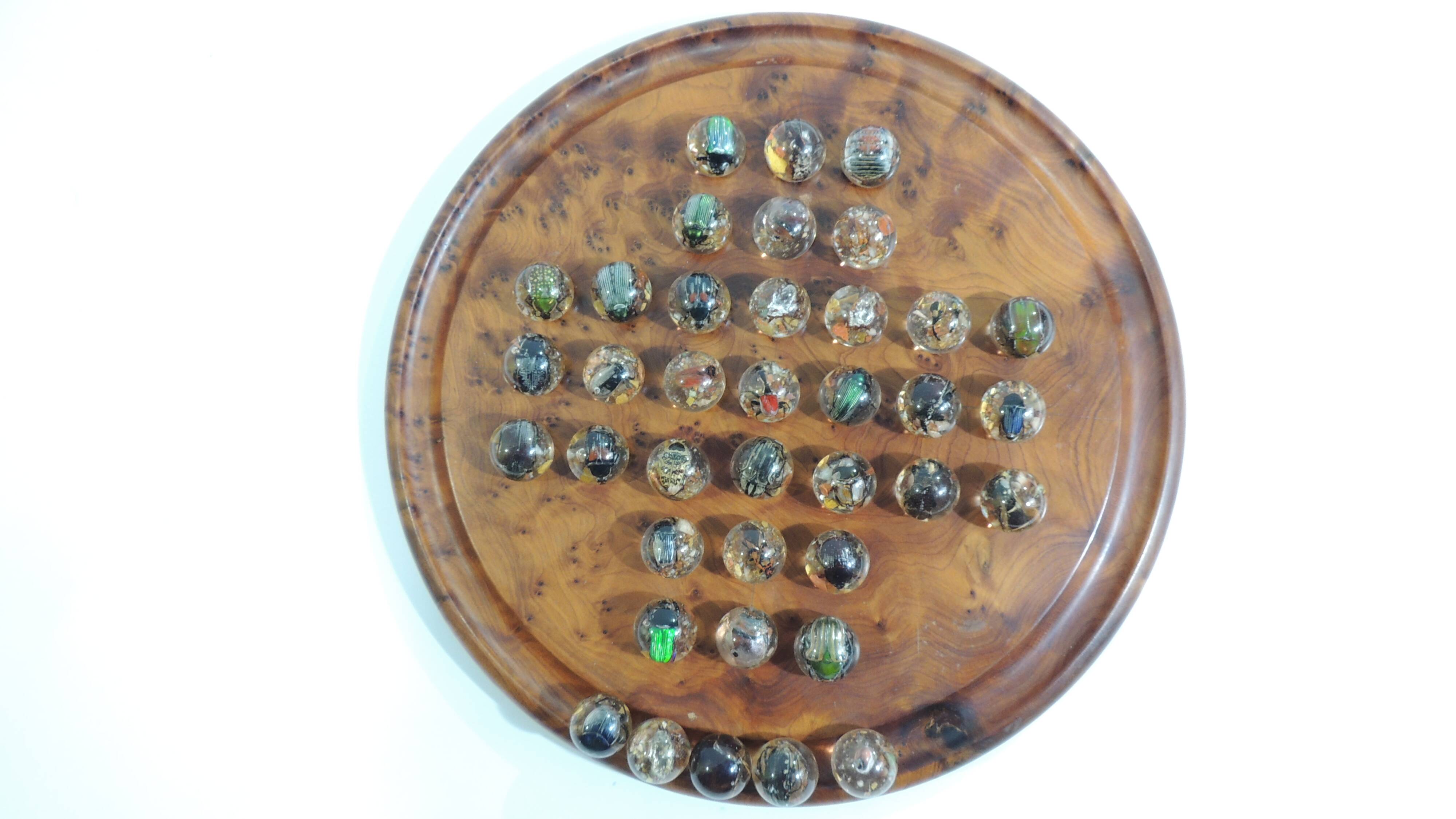 Vintage wooden solitaire game with resin balls and insects – Madaga