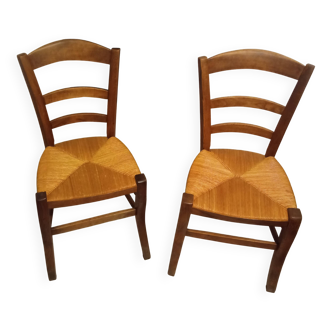 Pair of vintage wooden and woven straw chairs