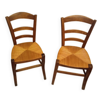 Pair of vintage wooden and woven straw chairs