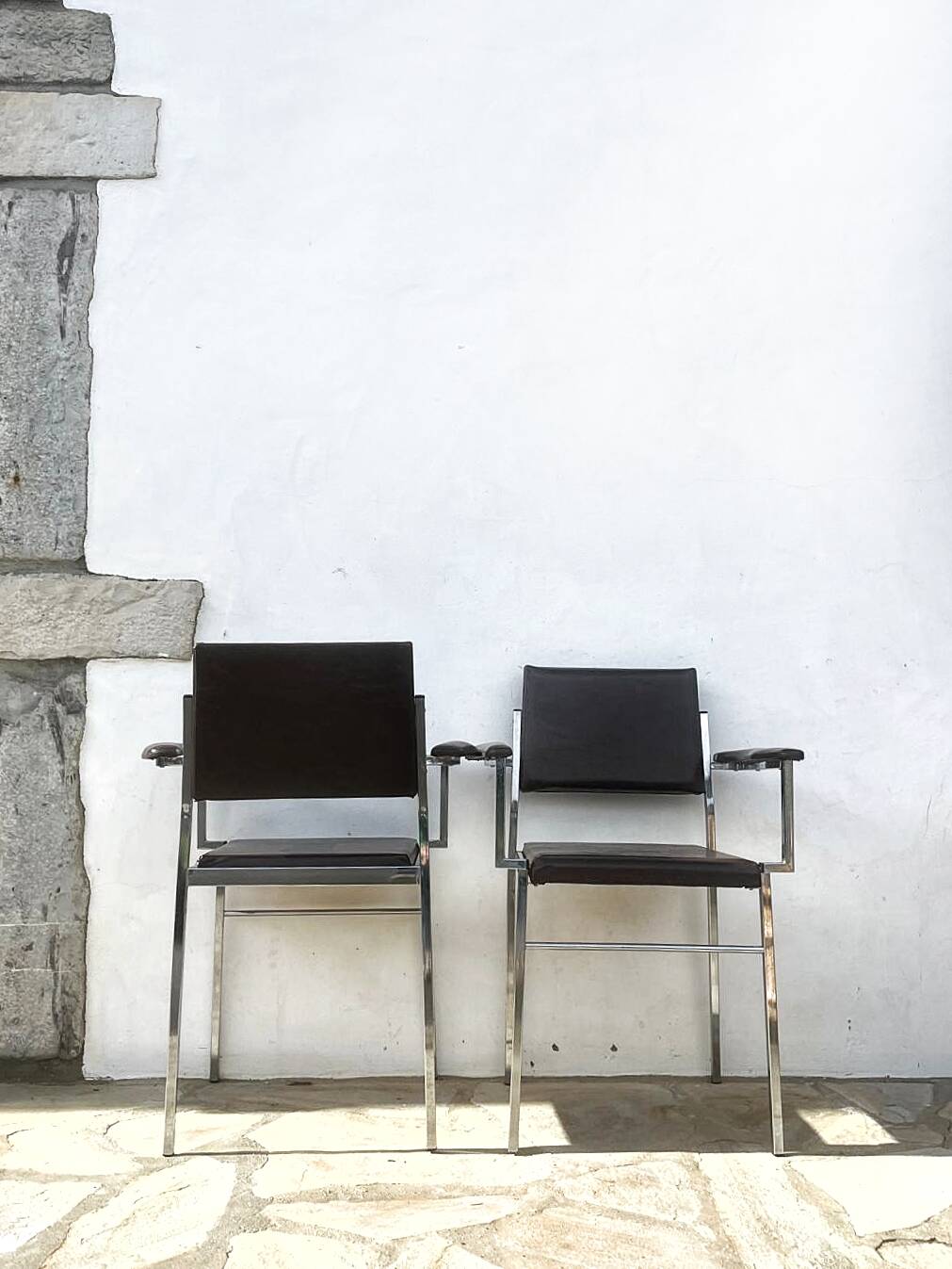 2 chrome designer chairs