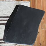 Black brutalist tripod stool