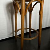 Curved wooden stool and cannage