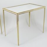 A pair of brass and white mirror tables from Vereinigte Werkstätten, Germany, 1970s.