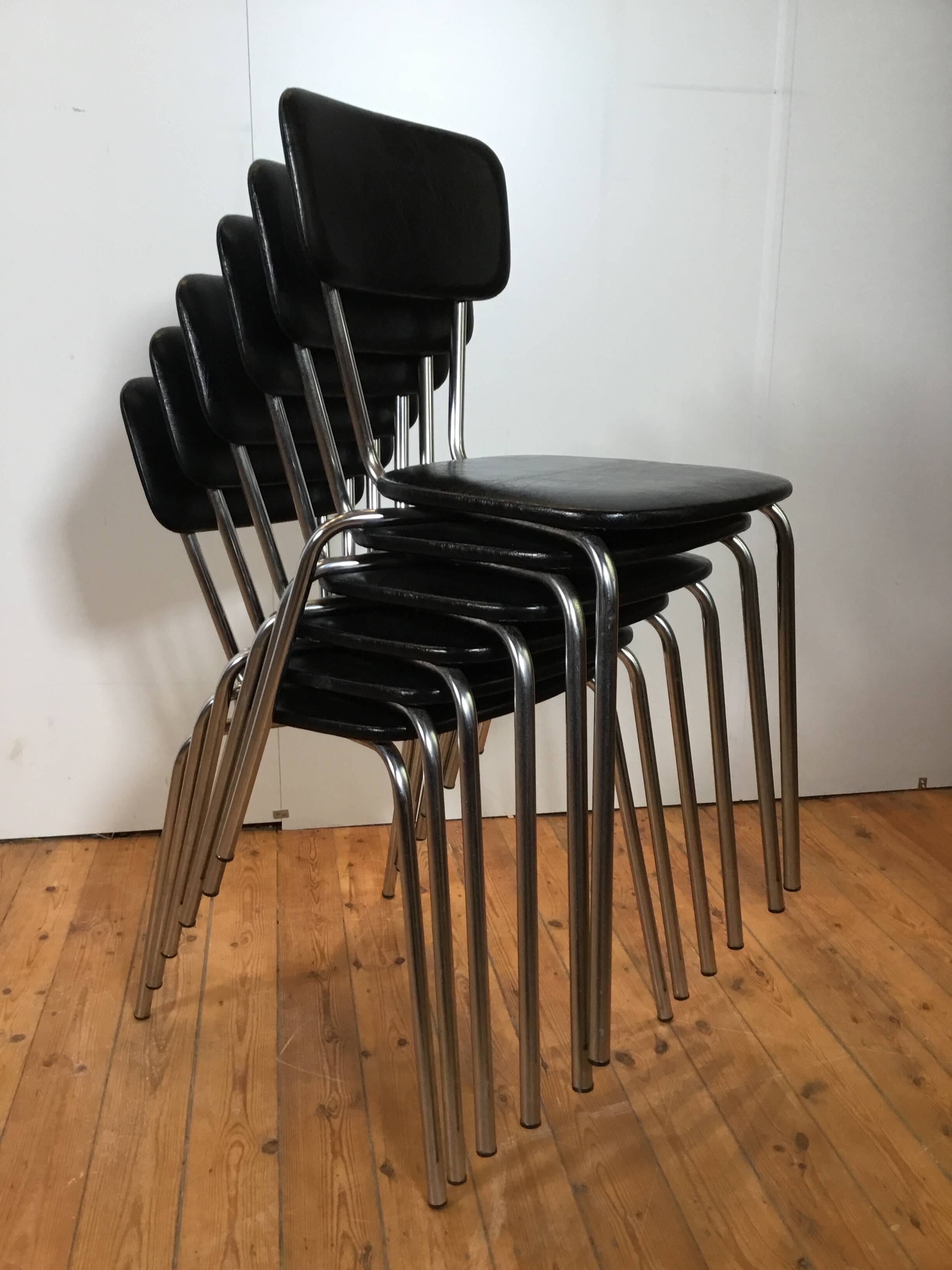 vintage chromed tubular steel stackable dining chairs
