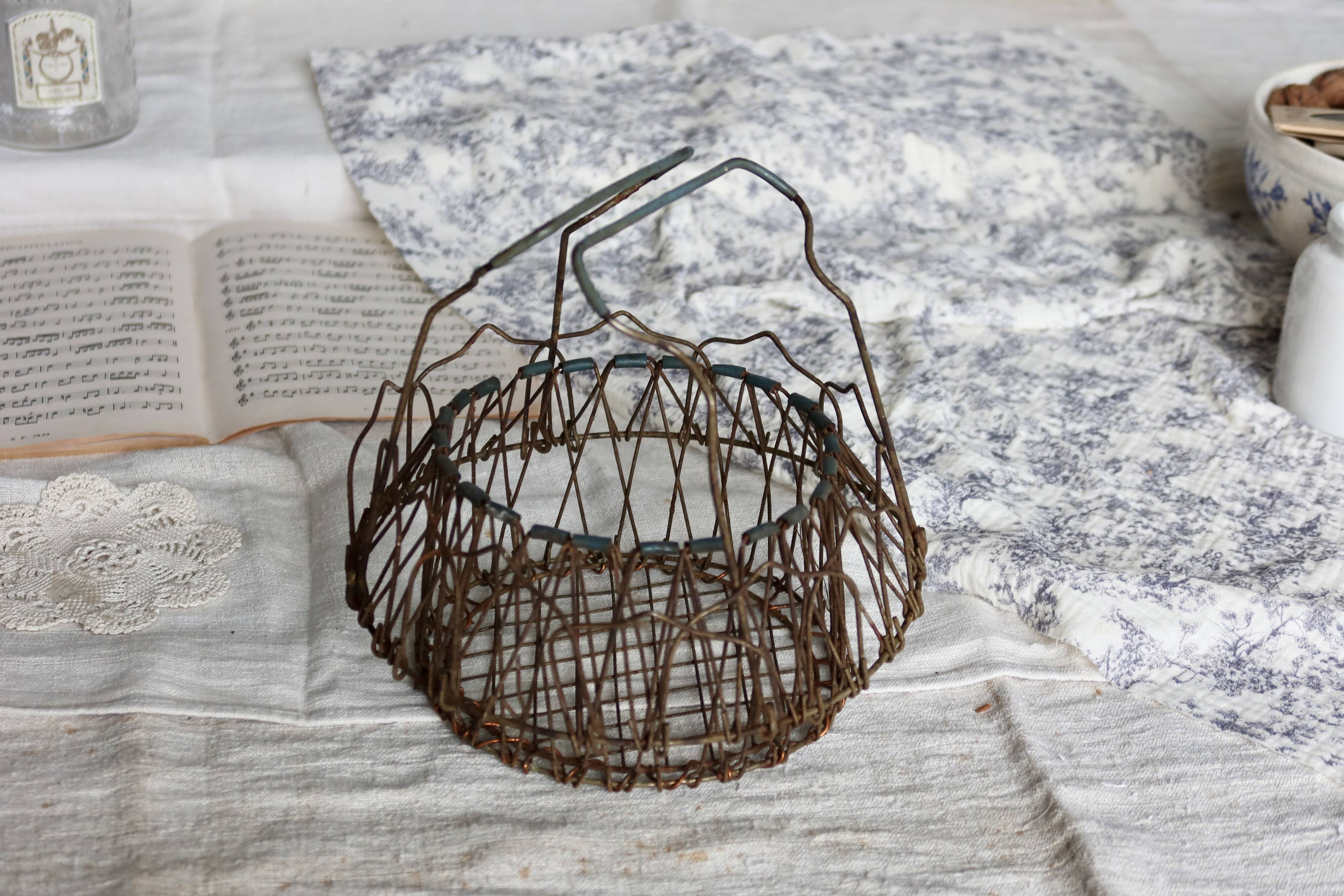 Vintage foldable metal basket in the shape of a flower