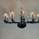 Venetian chandelier in Murano glass in black and colourless, 12 light arms, circa 1990.