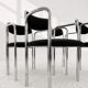 Vintage chairs with double chrome structure and black velvet. 70s