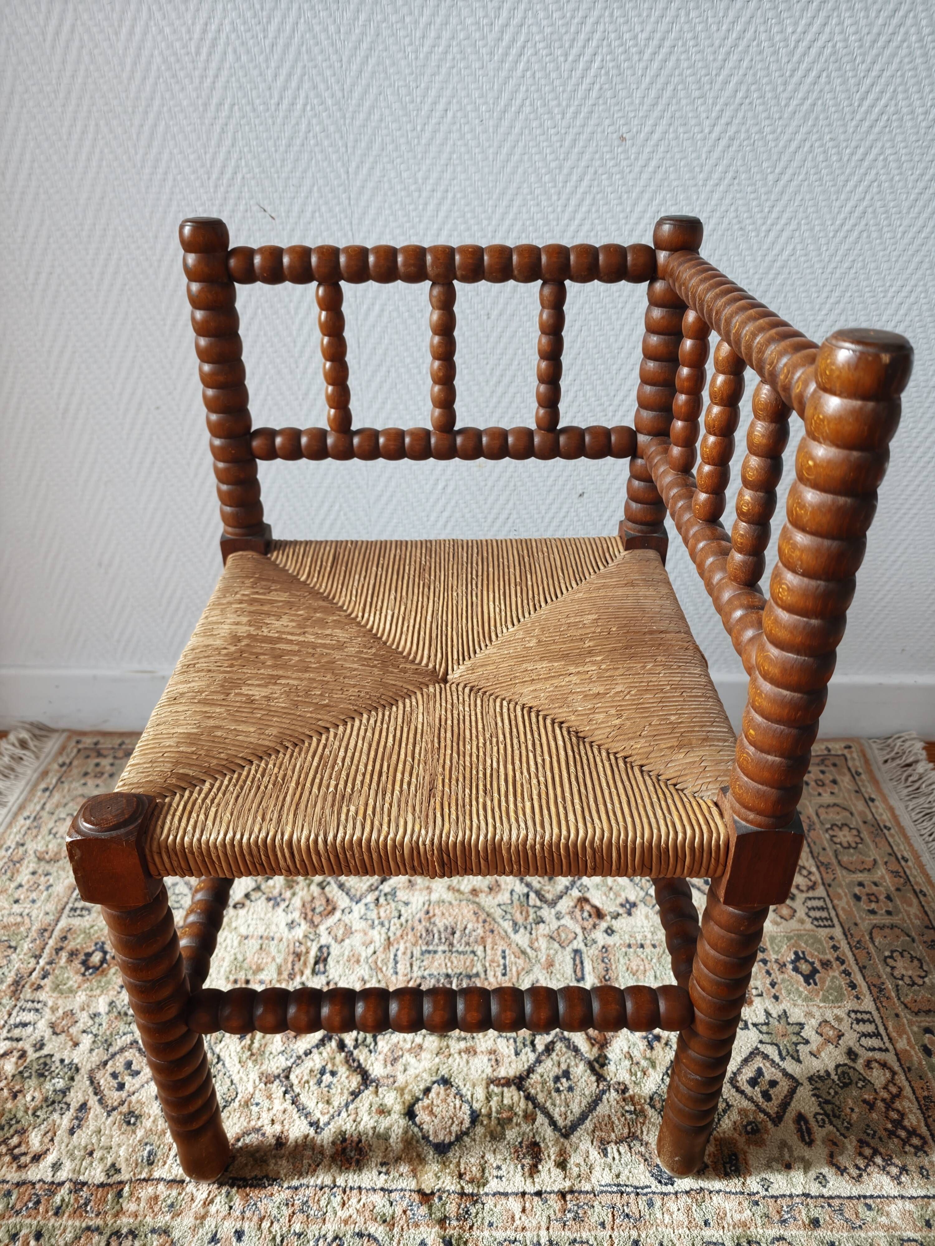 Chaise vintage coin du feu en bois tourné bobine