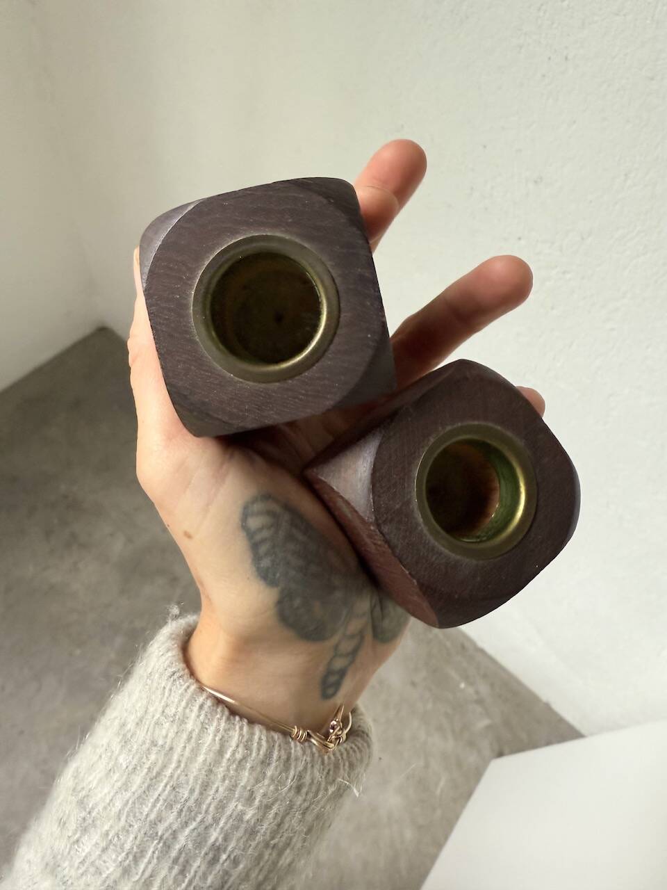 Pair of 1960s teak and brass "dice" candlesticks