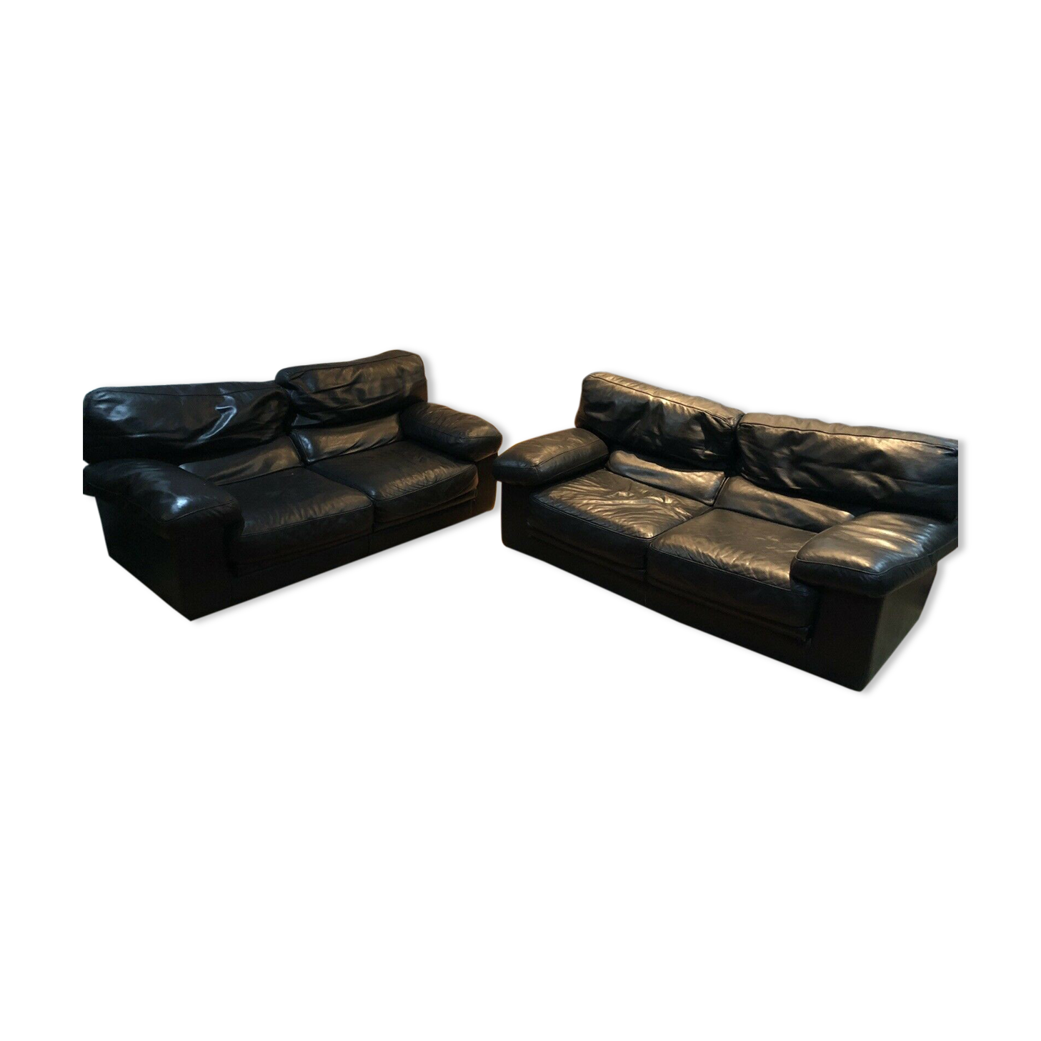 Pair of 2-seater sofas in black leather Roche & Bobois