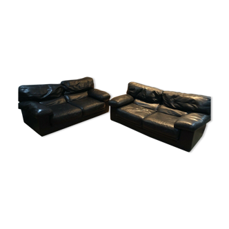 Pair of 2-seater sofas in black leather Roche & Bobois