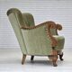 Fauteuil danois des années 1960, velours vert, bois de chêne sculpté.