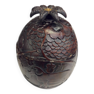 Vintage coconut ice bucket with pineapple and animal decorations.