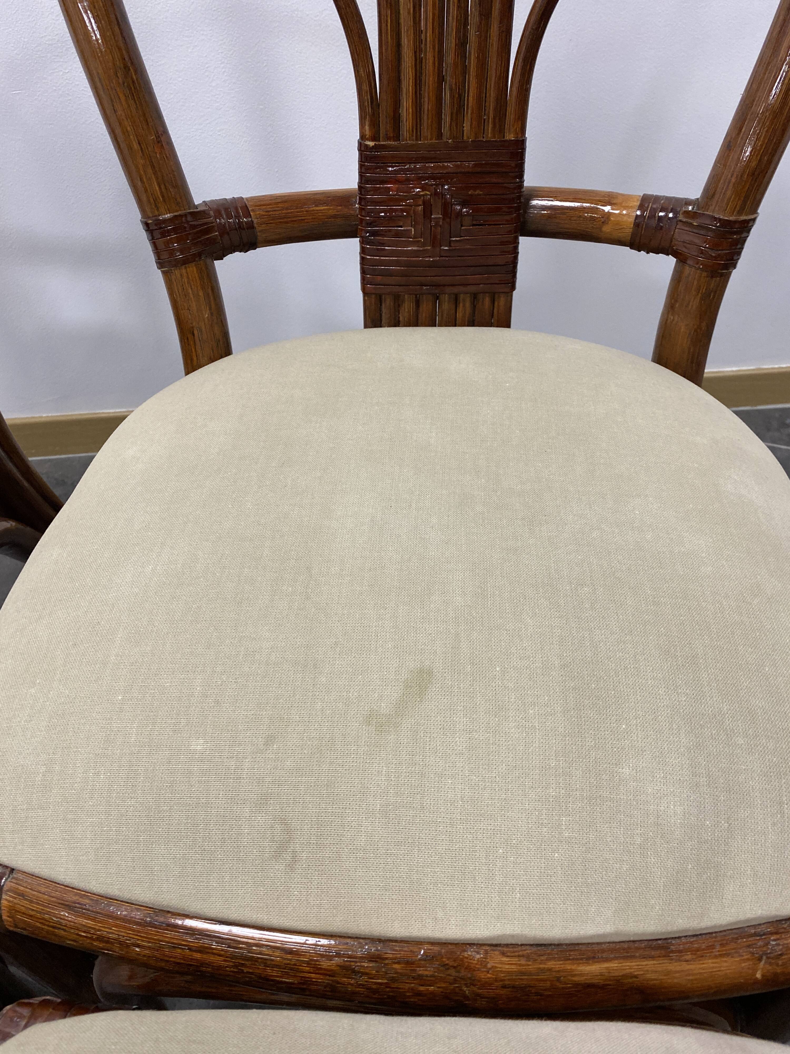 4 vintage woven rattan chairs