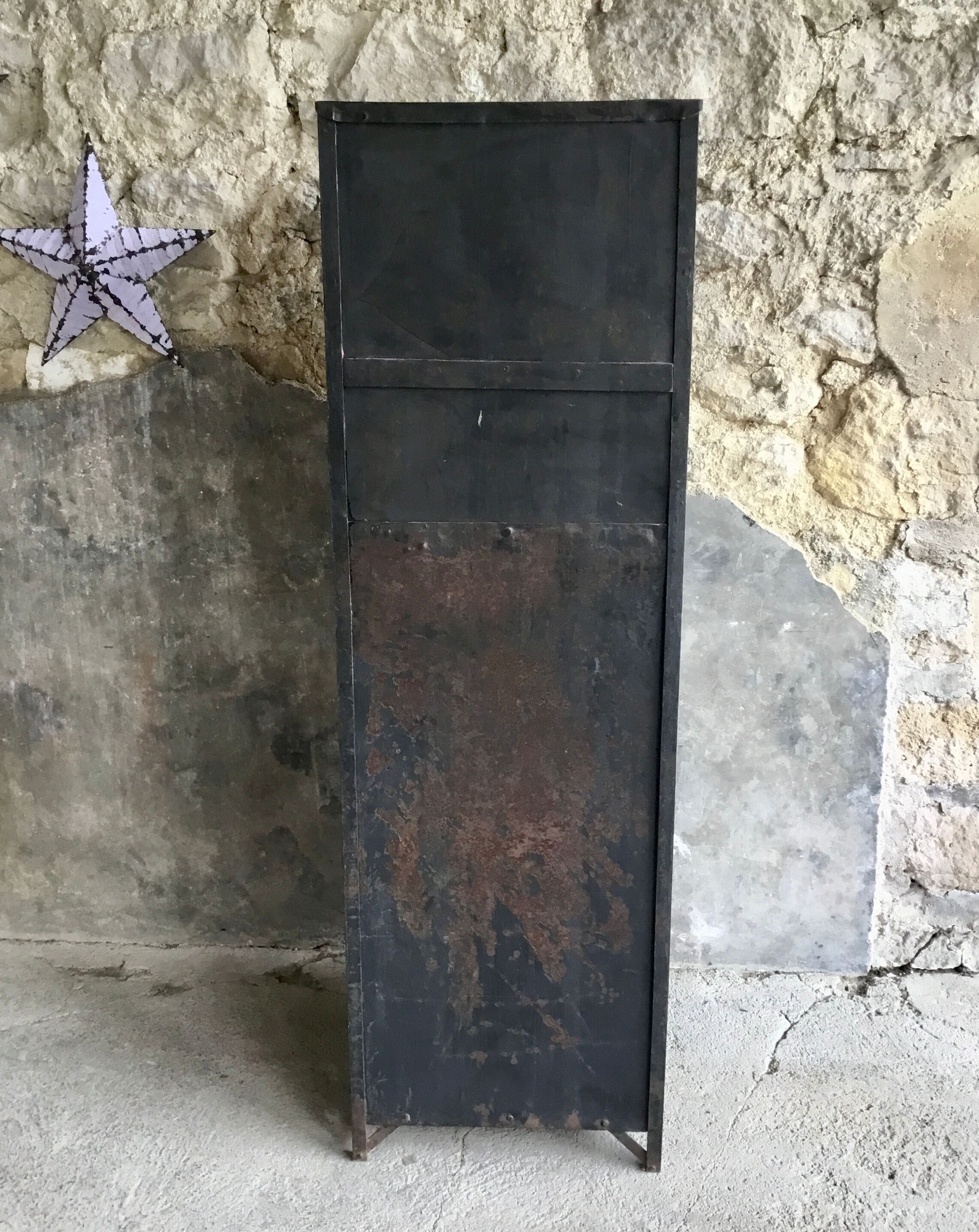 Riveted cloakroom converted into storage cabinet - early twentieth century