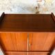 Storage cabinet with double compartment, metal feet circa 60's
