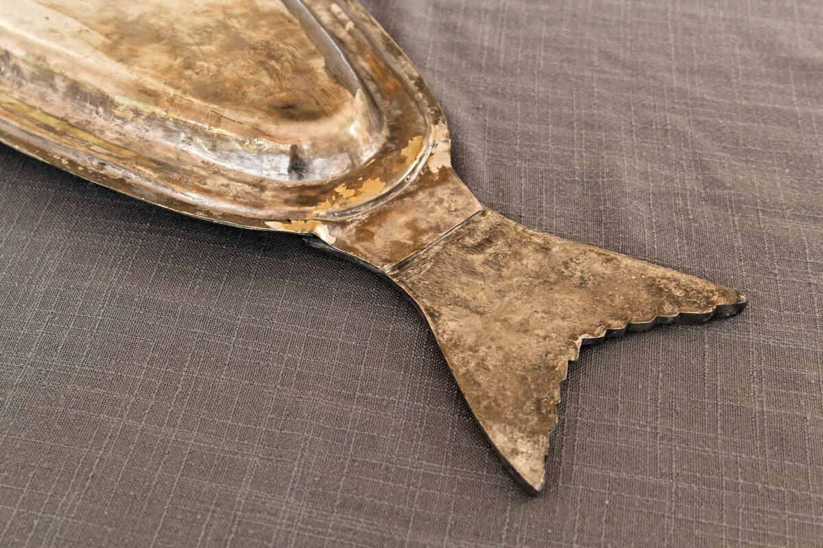 Ancient fish dish in silver metal