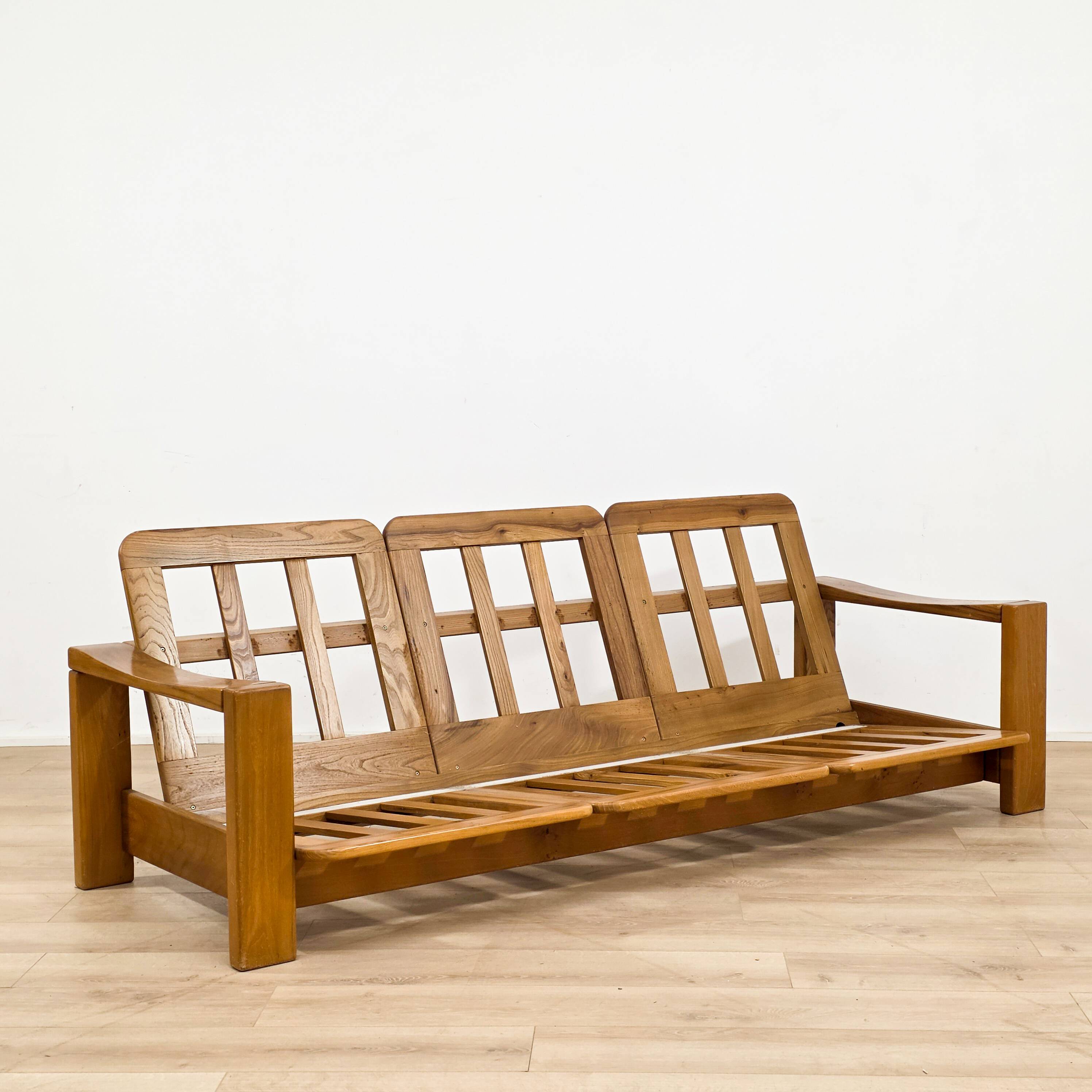 Solid elm sofa by Maison Regain from the 1970s.