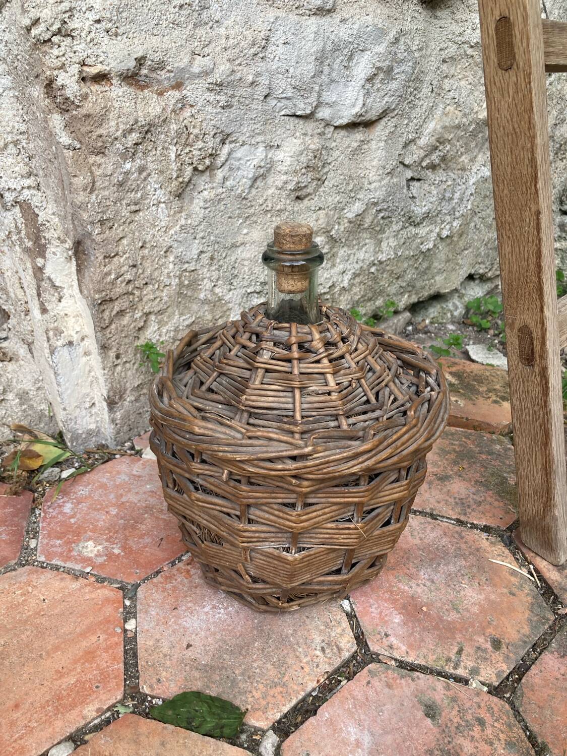 Vintage wicker demijohn