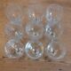 9 antique glasses in port or alcohol decorated with arabesques