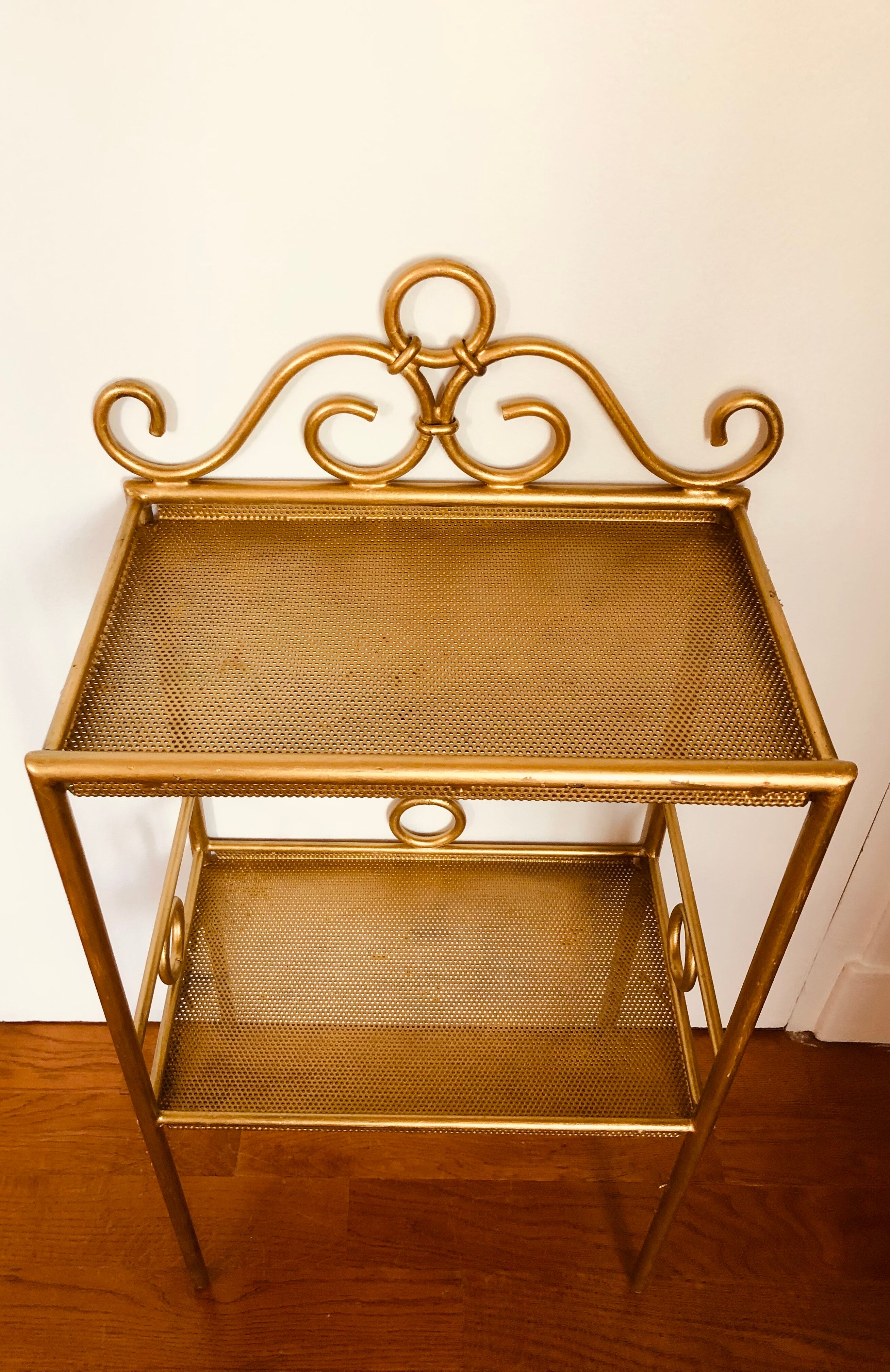 Gold-laquered metal shelf