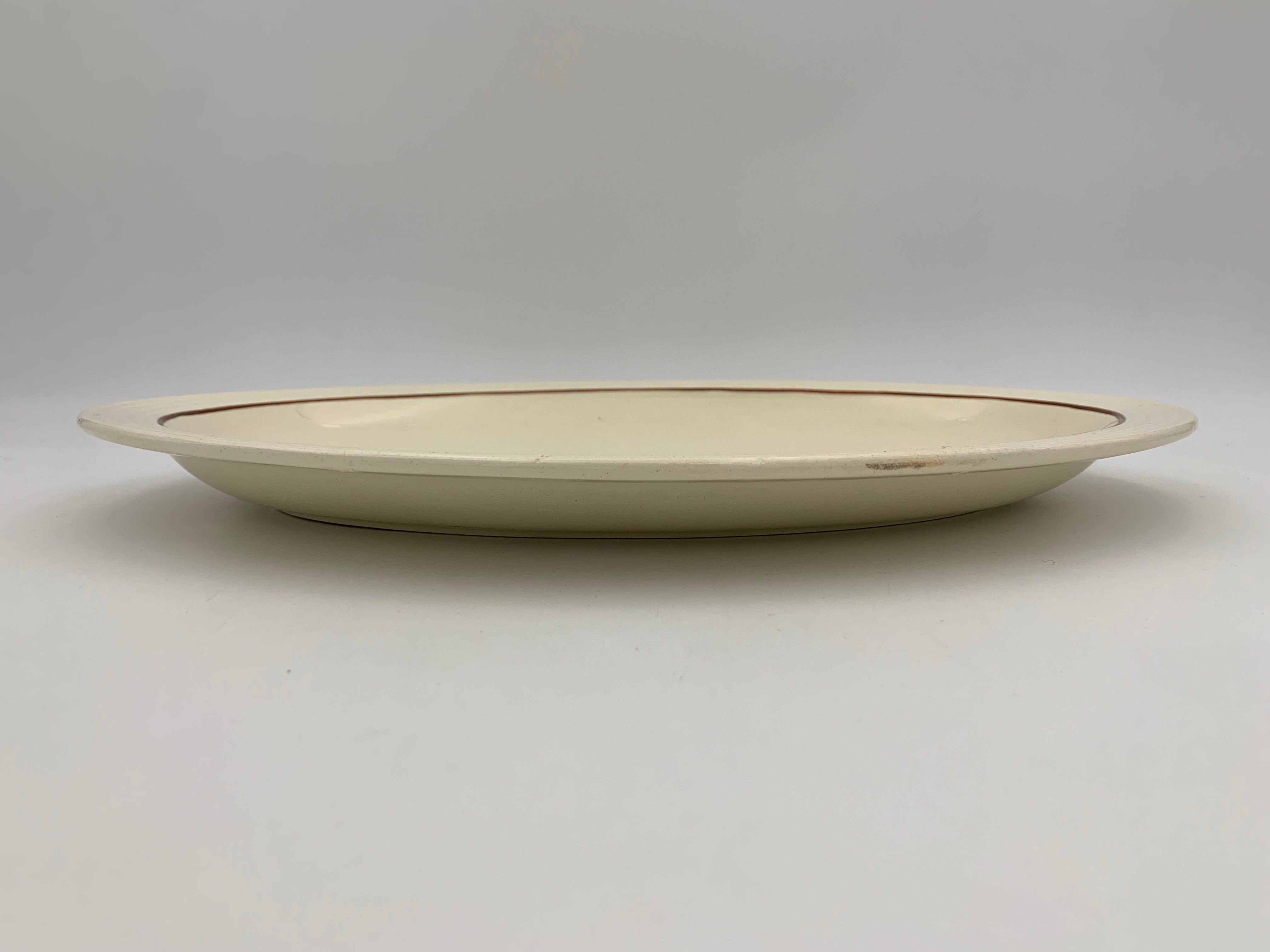 Two large oval art deco dishes in Longwy earthenware - 1930s