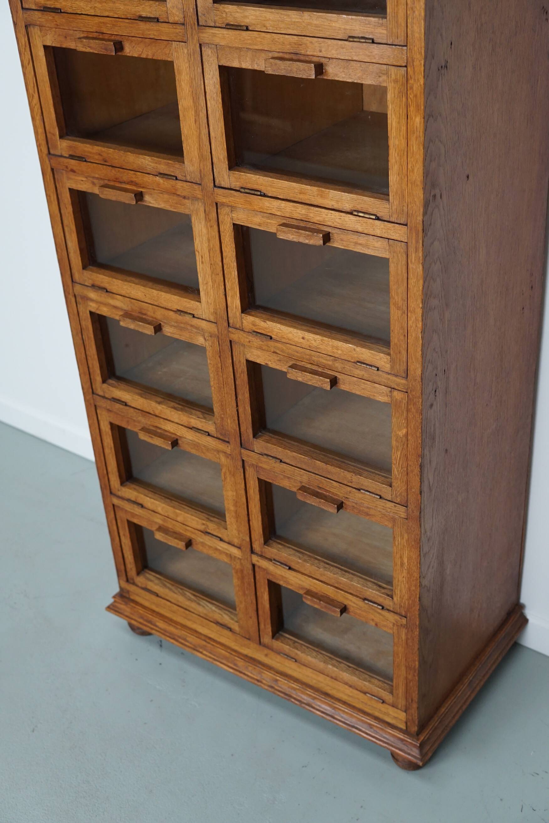 Vintage dutch oak haberdashery shop cabinet / vitrine drop down doors, 1930s