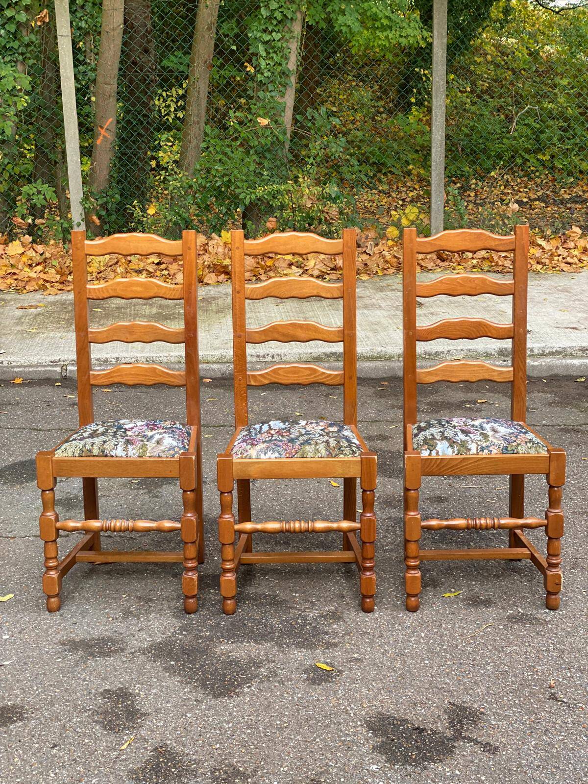 3 solid wood chairs with embroidered fabric