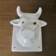 Stylized cow head in white ceramic, wall decoration from the 80s