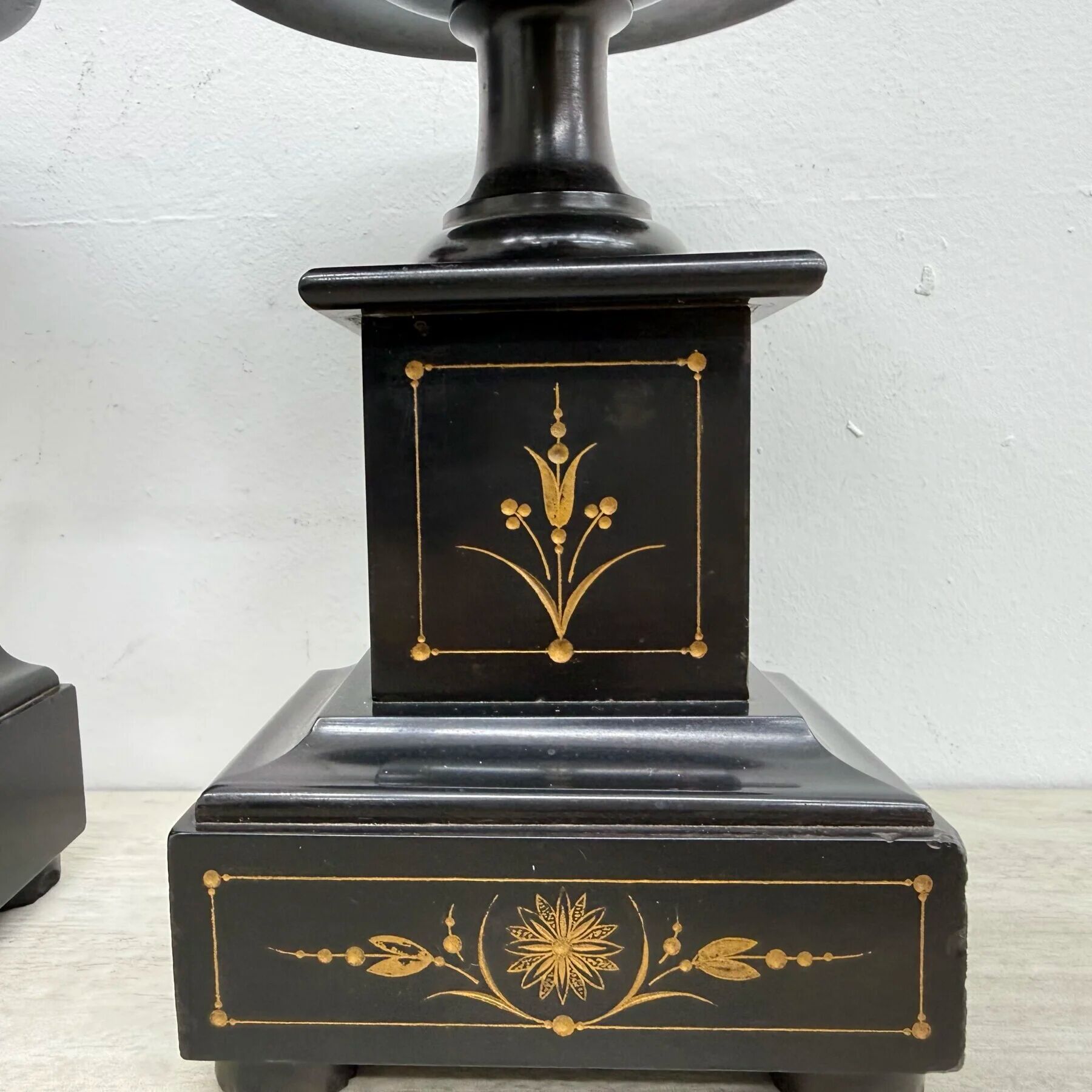 Antique French black marble cassoulets gilt decor pedestals neoclassical pair, 1900s