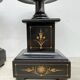 Antique French black marble cassoulets gilt decor pedestals neoclassical pair, 1900s